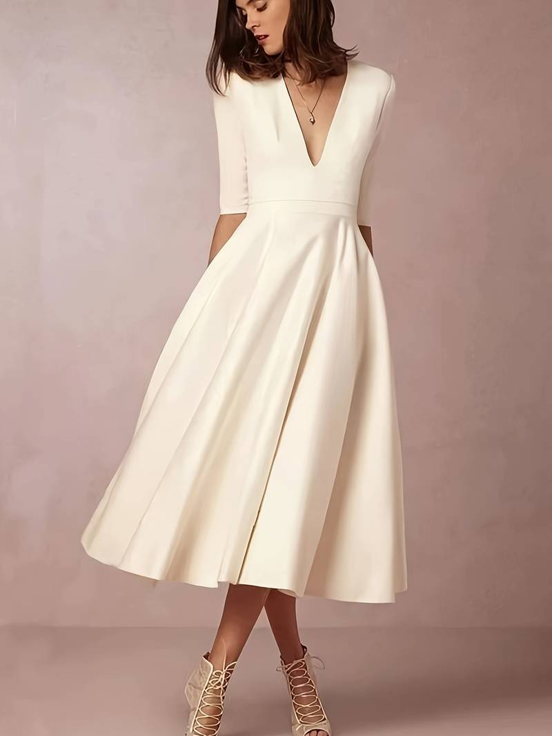 CALORA_ Fundira | Retro 60s A-lijn Maxi Swing Jurk