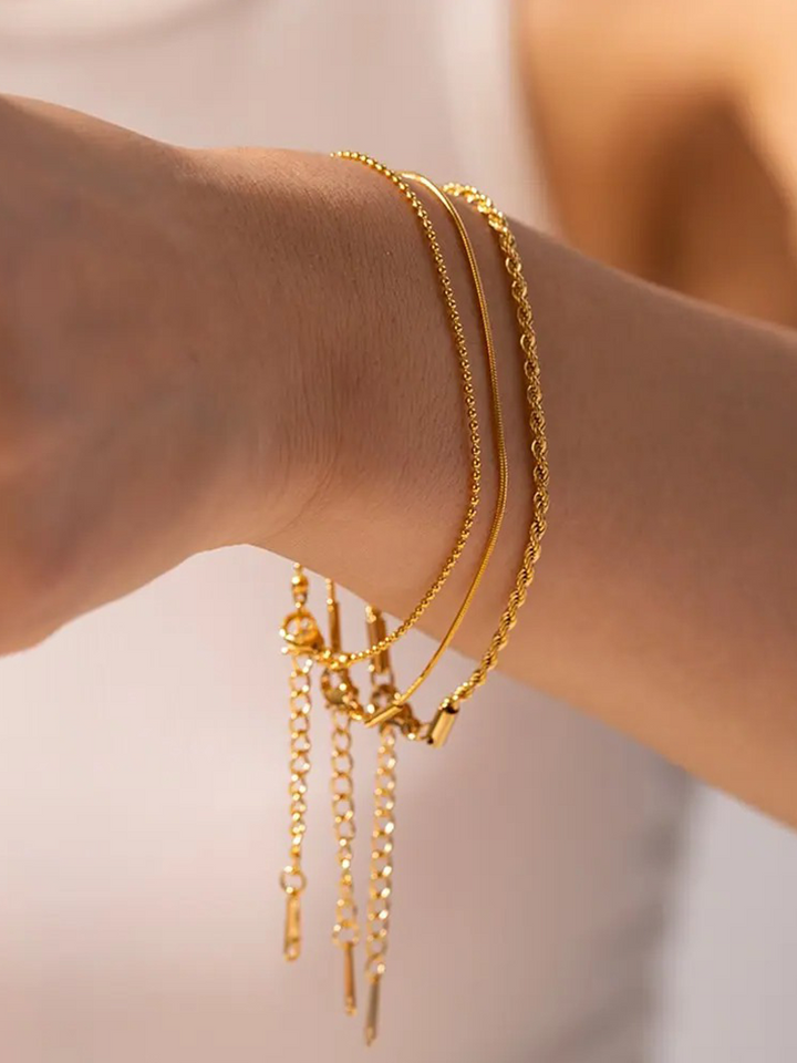CALORA_ 3-Laagse Armbanden Set Goud voor Stijlvolle Looks