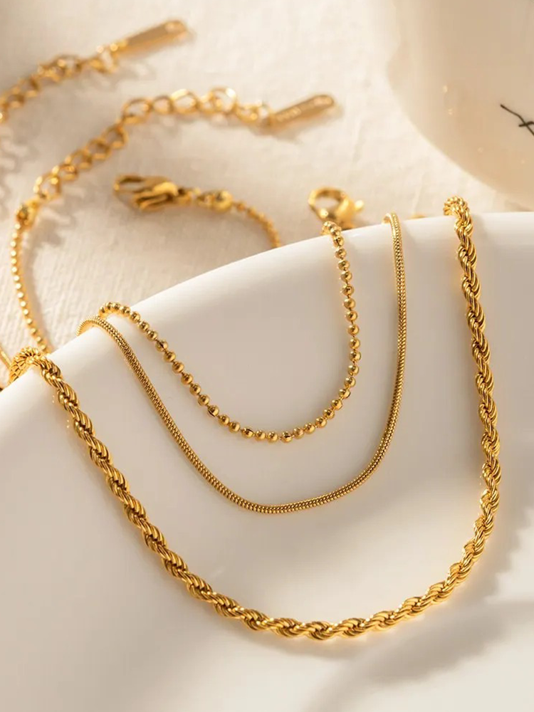 CALORA_ 3-Laagse Armbanden Set Goud voor Stijlvolle Looks
