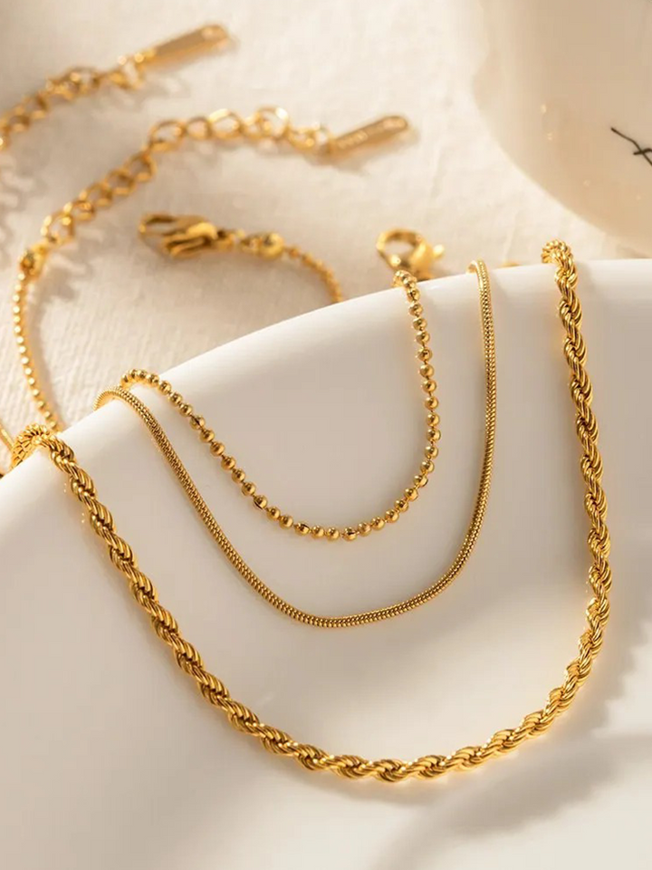 CALORA_ 3-Laagse Armbanden Set Goud voor Stijlvolle Looks