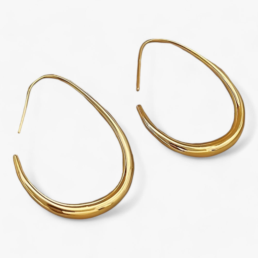 CALORA_ Arista Ovale Hoepeloorbellen | Zilveren Elegantie