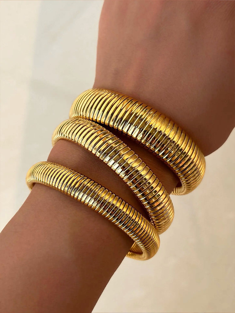 CALORA_ Brede Slang Armband Stretch Goud van Roestvrij Staal