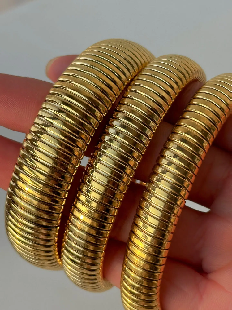 CALORA_ Brede Slang Armband Stretch Goud van Roestvrij Staal