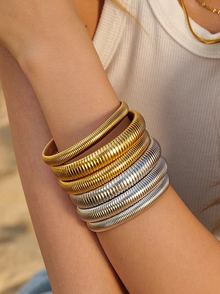 CALORA_ Brede Slang Armband Stretch Goud van Roestvrij Staal