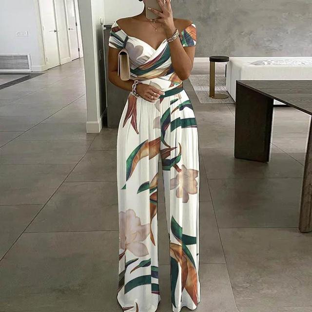 CALORA_ Dames Bloemen Jumpsuit met Off-Shoulder en Brede Pijpen