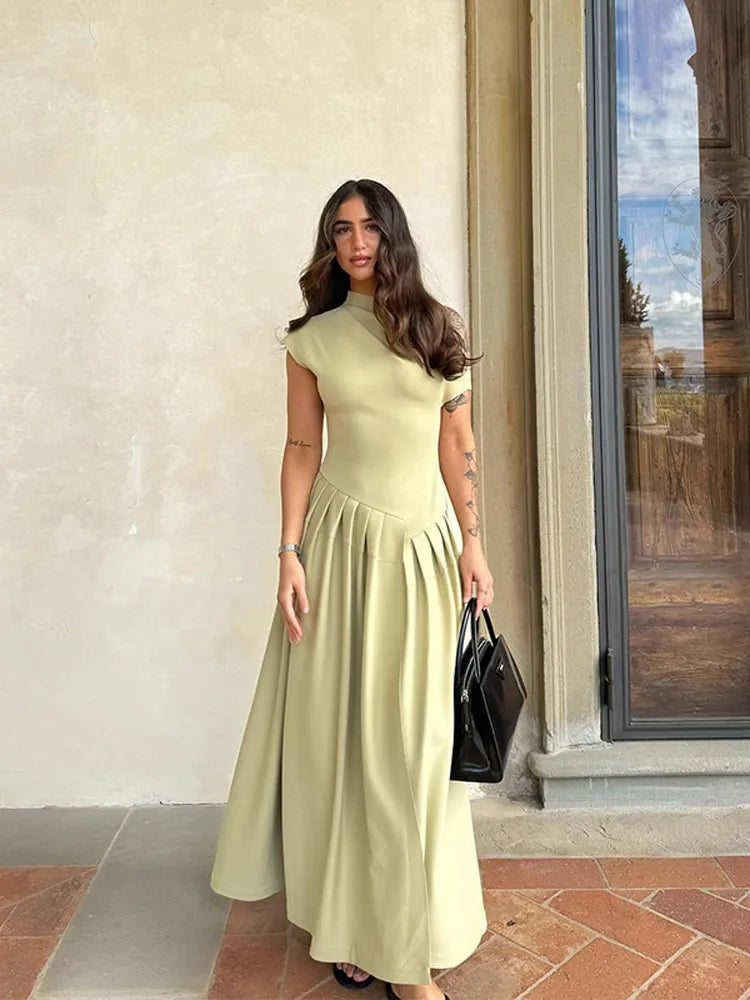 CALORA_ Elegante Groene Geplooide Jurk Met O Hals En Korte Mouw