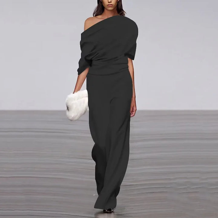 CALORA_ Elegante Lente Jumpsuit met Enkele Knopen en Moderne Stijl