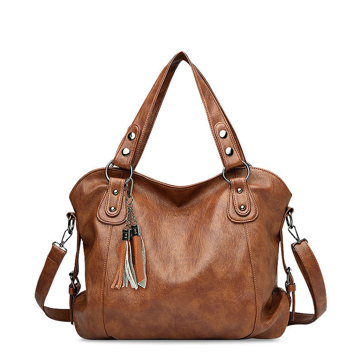 CALORA_ Elegante Vegan Leren Draagtas met Zachte Voering en Zwarte Details