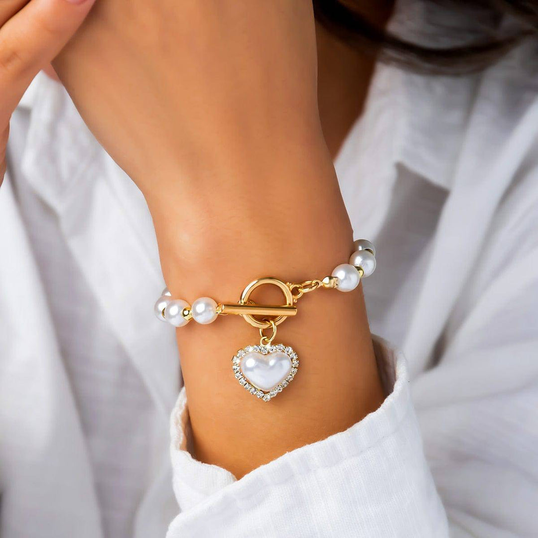 CALORA_ Elegante Zoetwaterparel Armband met Gouden Accenten