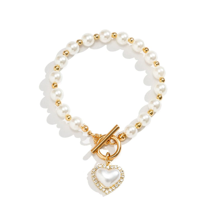 CALORA_ Elegante Zoetwaterparel Armband met Gouden Accenten