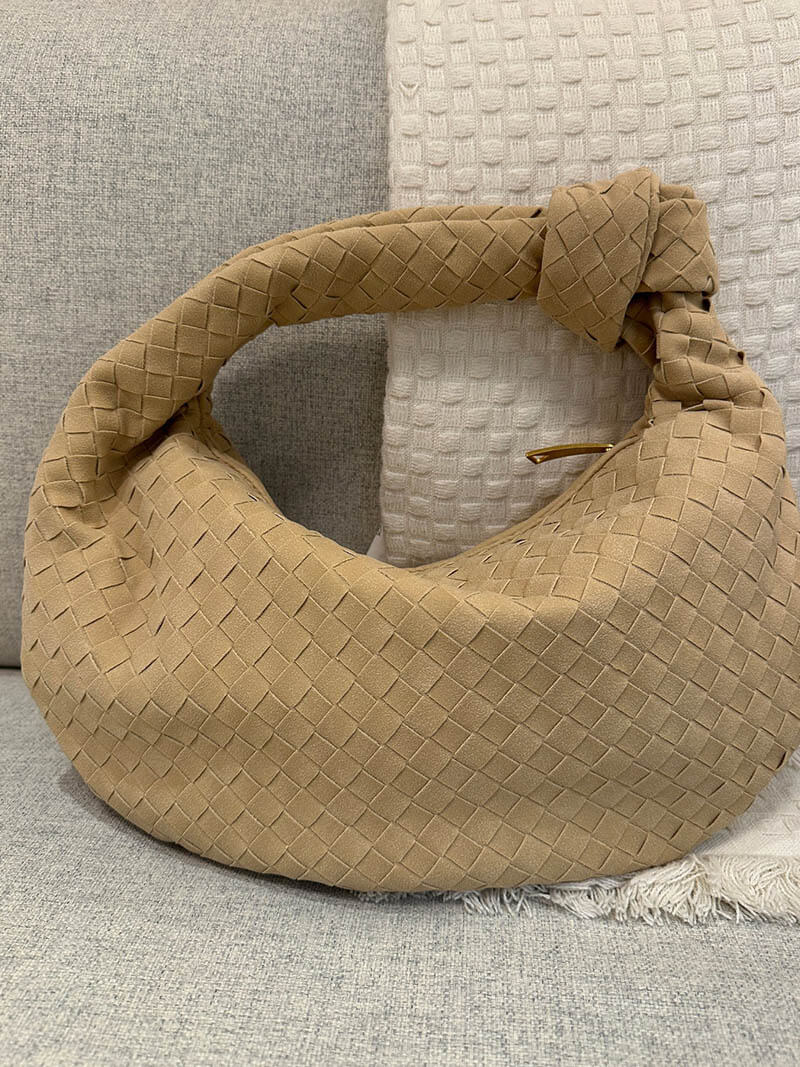CALORA_ Geweven Suède Handtas Medium met Knoopdetail
