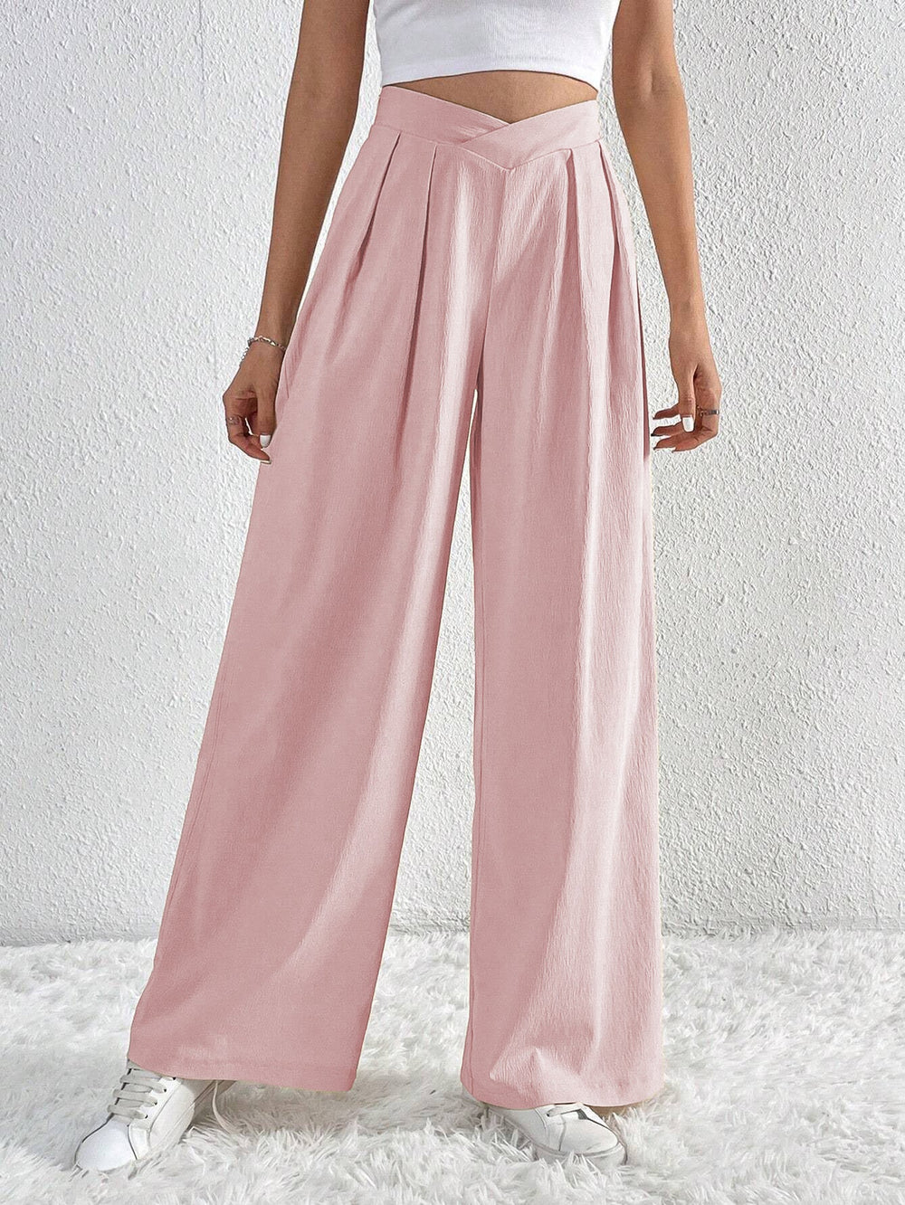 CALORA_ Wijde broek met zakken en hoge taille