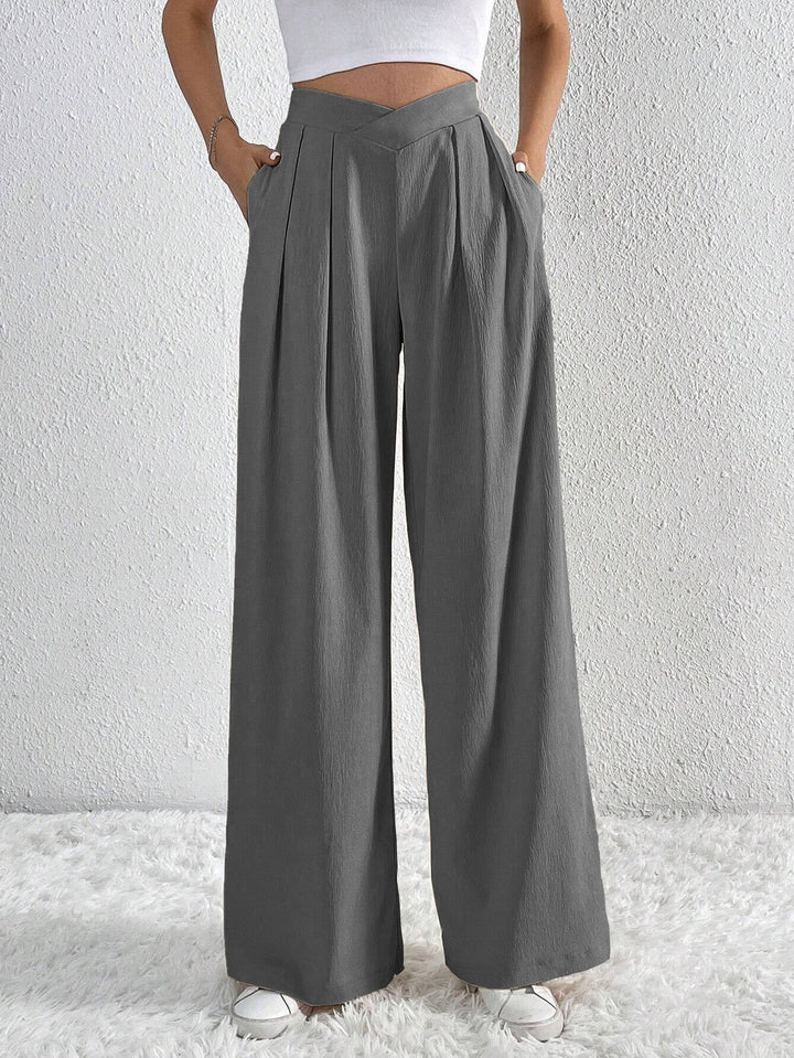 CALORA_ Wijde broek met zakken en hoge taille