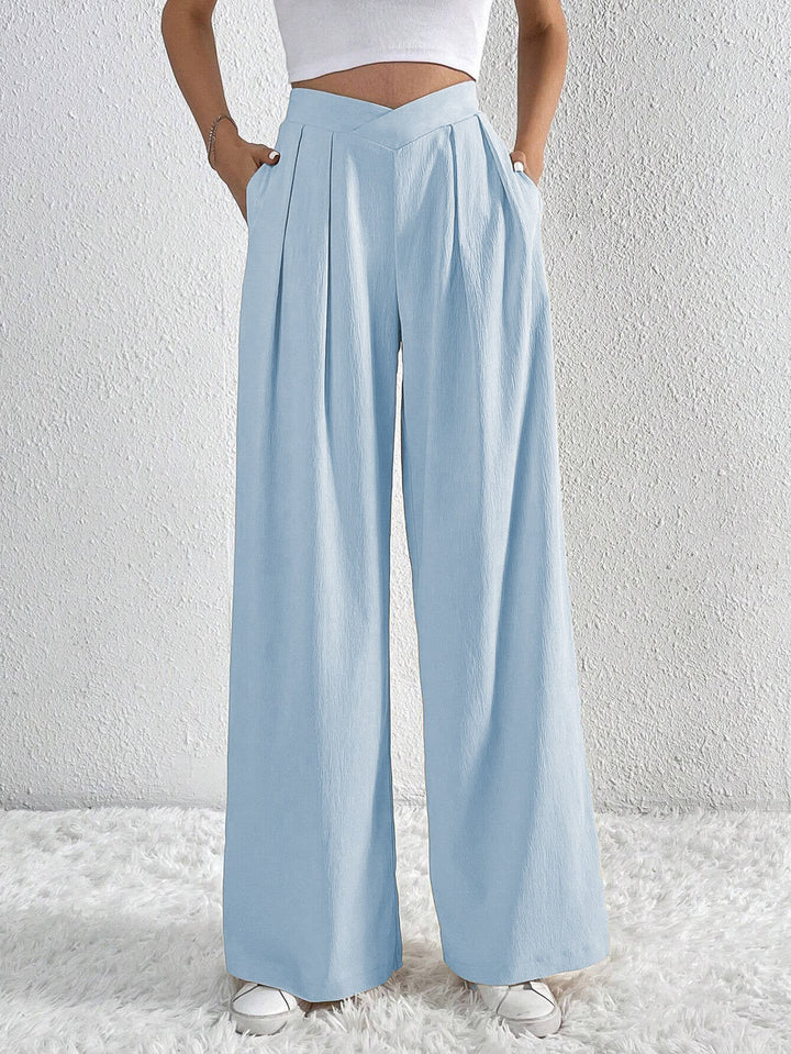 CALORA_ Wijde broek met zakken en hoge taille