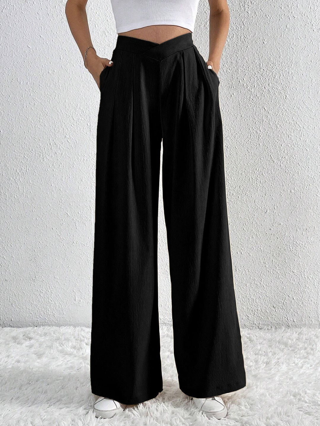 CALORA_ Wijde broek met zakken en hoge taille