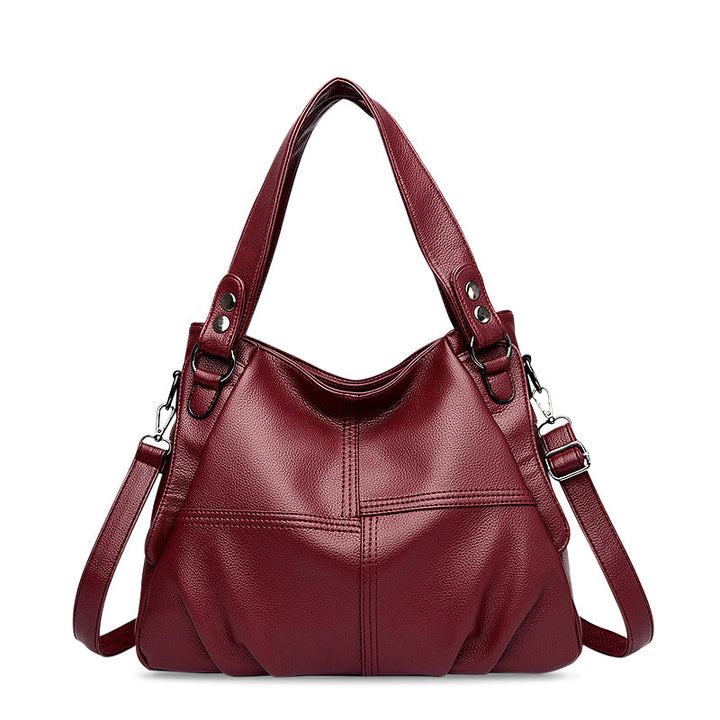 CALORA_ Zwarte Vegan Leren Handtas met Schouderriem en Stijlvol Design