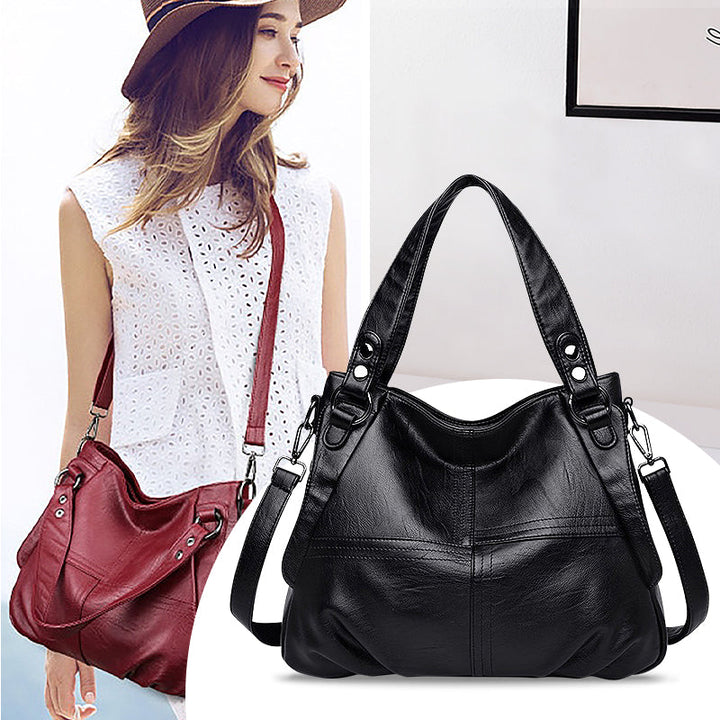 CALORA_ Zwarte Vegan Leren Handtas met Schouderriem en Stijlvol Design