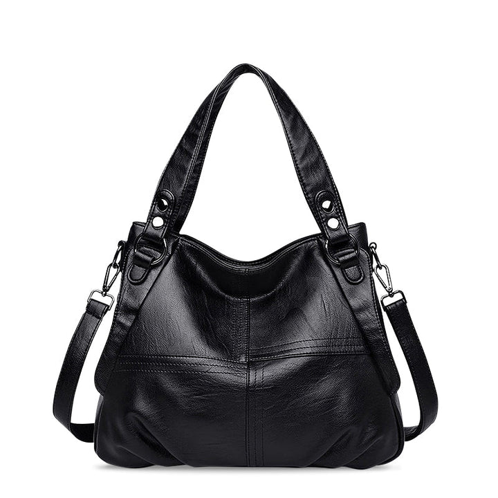 CALORA_ Zwarte Vegan Leren Handtas met Schouderriem en Stijlvol Design