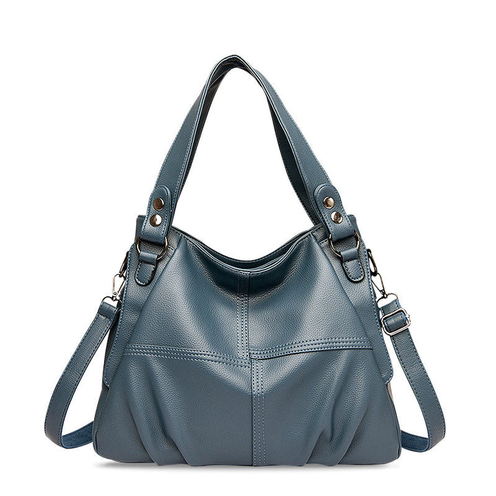 CALORA_ Zwarte Vegan Leren Handtas met Schouderriem en Stijlvol Design