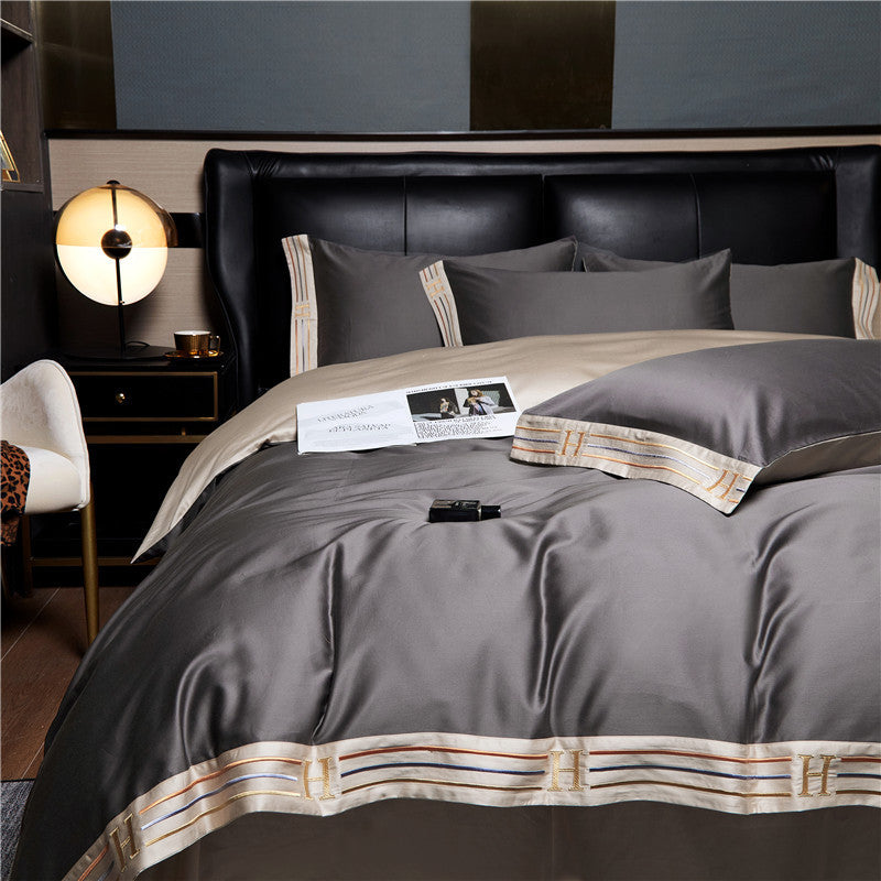 CALORA_ Luxe Geborduurd Satijnen Katoen Beddengoed Set - 4-delig - Comfortabel en Ademend